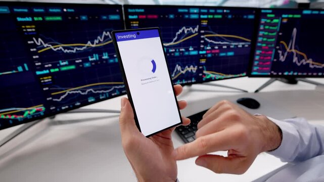 Stock Broker Looking At Exchange Graph
