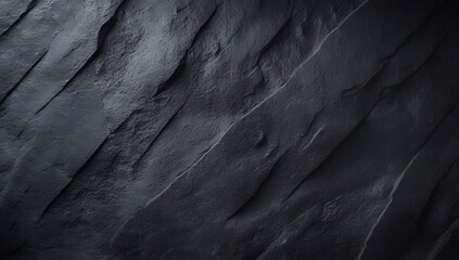 Dark slate rock texture with diagonal ridges and grooves