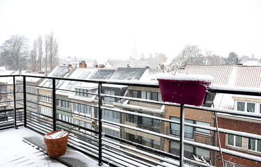 Snow-covered terrace in residential area