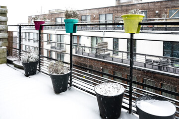 Snow-covered terrace in residential area