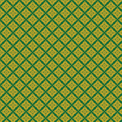 Green background with repeating yellow floral design, symmetrical pattern.