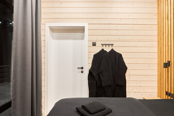 Rustic entrybedroom with coats mountain guide quarters