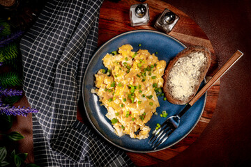Scrambled eggs with onion and chives.