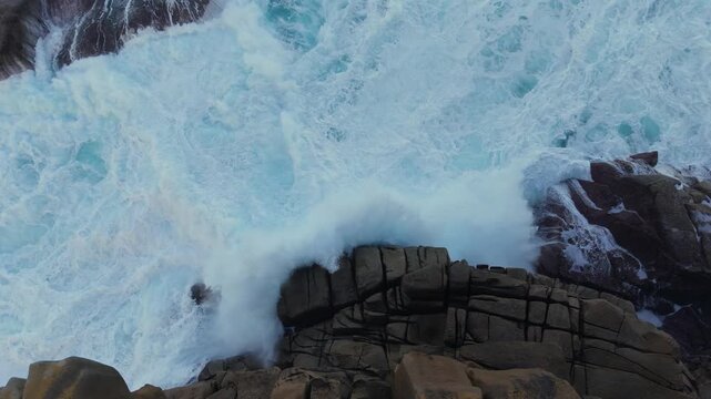 Foamy Waves Along Sea Cliffs Of Cant&iacute;s de Papel In Moras, Lugo, Spain. Aerial Slow Motion Shot
