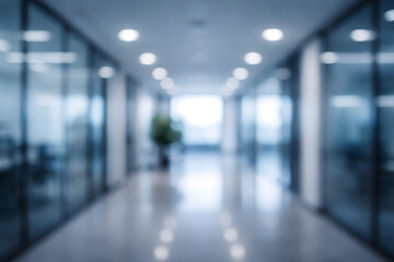 Fototapeta premium Blurred modern office hallway with glass doors