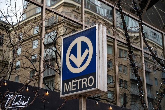 Close up of Montreal metro sign on city street. Montreal, Canada - December 18, 2025.