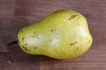 Sweet green pear, slice of ripe sweet pear.