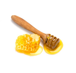 Honeycomb with honey liquid on white backgrounds.