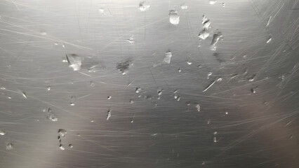 Scratched and dented metal surface with rugged industrial texture
