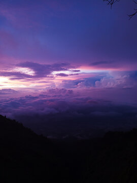 The purple sunset view is so iconic, dramatic, and beautiful that it has become a characteristic of Mount Merbabu, Indonesia.