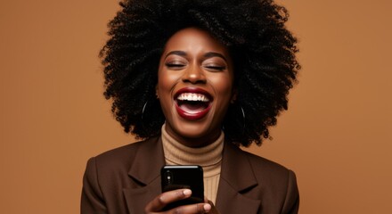 Joyful Black Woman Laughing While Looking at Her Smartphone Screen