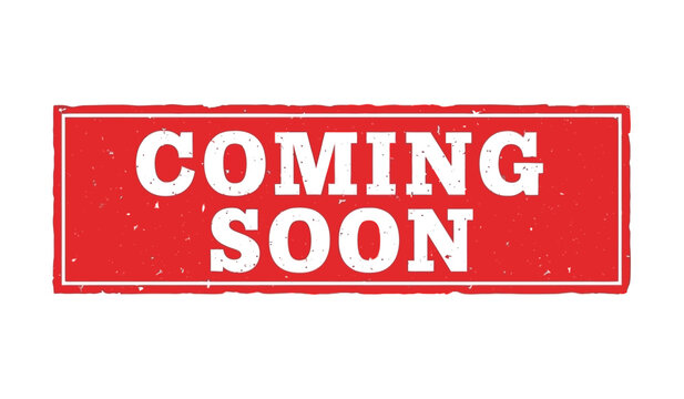 A red rectangular sign with white text reading coming soon