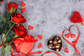 Food for Valentine's Day or Women's Day, Gourmet heart shaped chocolate candies, sugar cranberry, meringue and rose flowers, greeting card, advertising banner or store invitation.