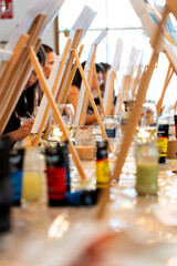 Women enjoying sip and paint art workshop