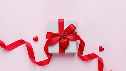 &ldquo;Valentine&rsquo;s Day gift box with red ribbon and heart decoration, pastel background, soft studio lighting, top-down flat lay, minimal clean composition, copy space.&rdquo;                                    