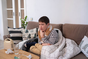 Sick boy touching neck unwell coughing with sore throat pain,bronchitis,Bronchial Asthma,Tuberculosis,pneumonia,covid-19,eco air pollution pm2.5.insurance and hospital