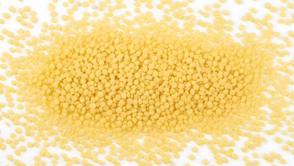 Small Yellow Couscous Grains Background for Middle Eastern Cuisine Concept