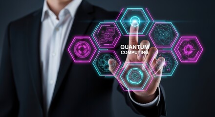 Hand touching glowing quantum computing interface on dark background