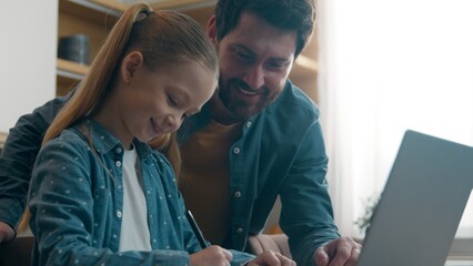 Caucasian happy family childcare smiling father helping with homework little girl school child daughter studying knowledge distant education online at kitchen with laptop writing at home schooling