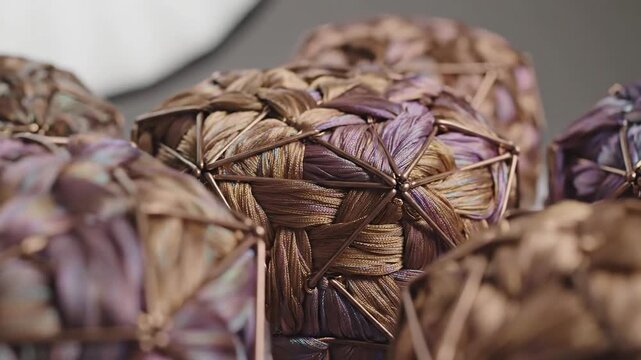 Close up of traditional woven food items with intricate patterns and textures.