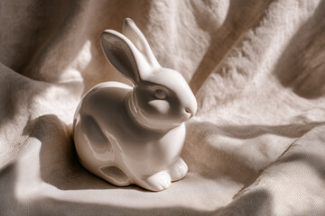 White Bunny Resting on a Tablecloth &mdash; Soft Light and Gentle Mood