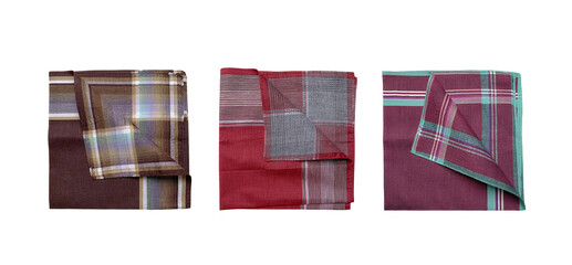 Three vinage folded patterned handkerchiefs isolated on a transparent background.