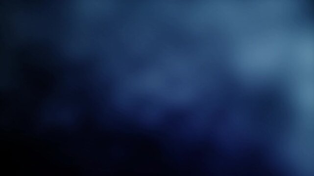 generic corporate non-descript background wallpaper animation with a soft blue and black dark gradient of defocussed misty clouds and fog with a technology tech business and science feel theme 4K 