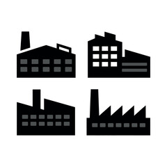 Obraz premium Four distinct black silhouettes of industrial factory buildings are shown together.