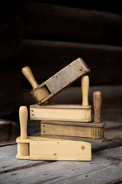 Detail of a Wooden Ratchet (Cog Rattle), a traditional folk and liturgical idiophone instrument.