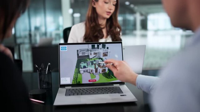 Team Of Engineers Using CAD Software