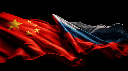 chinese flag waving next to russian flag on dark black background. relations between china and russia