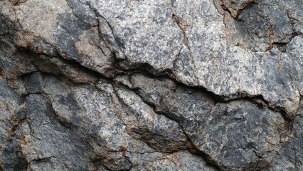Textured Rock Surface with Cracks