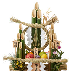 Japanese kadomatsu New Year decoration with bamboo, rope and fruits isolated on black