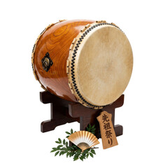 Traditional Japanese taiko drum on wooden stand isolated on black