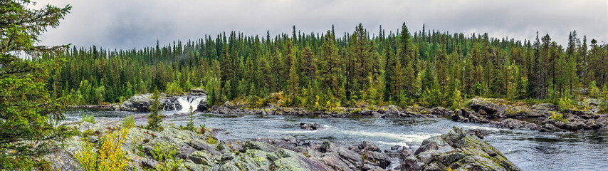 Lapland wilderness landscape with river and forest