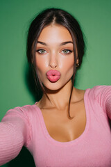 Influencer Woman Taking Selfie in Natural Light on Green Screen