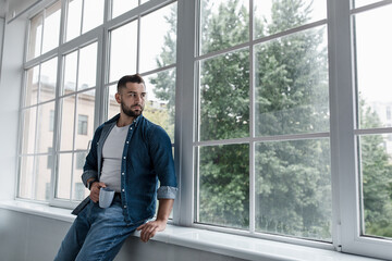 Tired male feeling sad tired and experiencing depression in mental health, problems and broken...