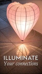 Lit Heart Shaped Paper Lantern Creating a Shadow on a Textured Floor Illuminate Connections