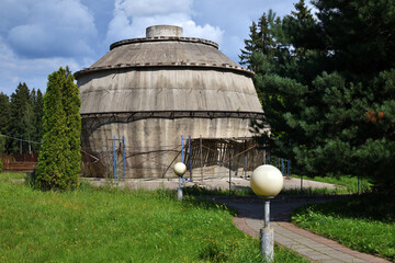 An abandoned circular concrete structure of unknown purpose