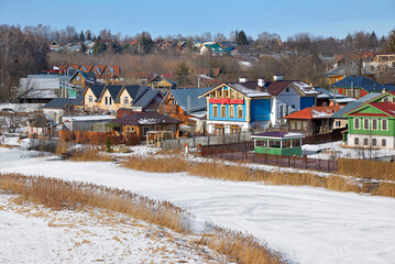 Suzdal, Russia, cityscape with Kamenka river and wooden houses