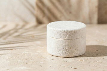 Sustainable Cosmetic Jar Made from Biodegradable Mushroom Mycelium in a Luxury Spa Setting.