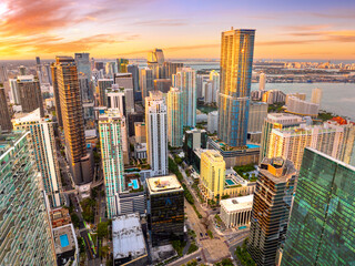 Miami Brickell in Florida, USA at sunset. View from above of skyscraper buildings in downtown...