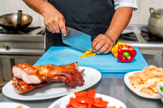 Chef hands preparing chifa stir fry ingredients