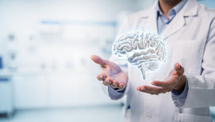 Scientist holds a floating brain model in a research lab during a study on neuroscience and cognitive functions