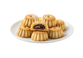 golden mini ring pastries with chocolate filling on white plate
