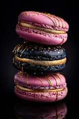 Stacked Pink And Black Macarons With Gold Accents Create An Elegant Gourmet Dessert Display