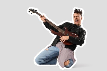 Naklejka premium Cool young man with dreadlocks playing guitar on light background