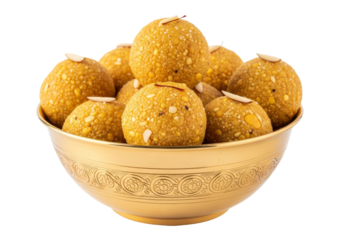 golden sesame laddus in a decorative bowl, traditional indian sweets