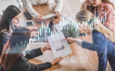 A diverse group of business professionals collaborates in a modern office, analyzing charts and reports, with digital data overlay enhancing insights and discussions. Scalp