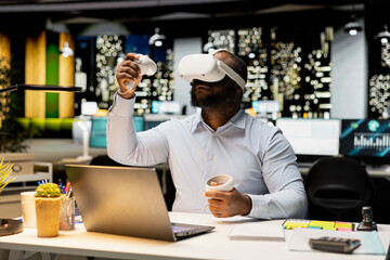 African american employee using AI tools with virtual reality late at night, working hard in the office with VR glasses to ensure fact checking and forecasting projections. Strategy room.